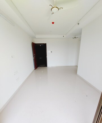 Living Room in 2 BHK Apartment at Regency Antilia, Ulhasnagar – for Sale