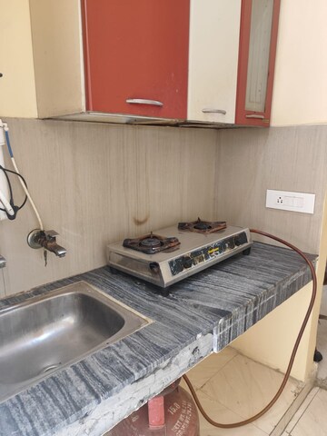 Kitchen in 1 RK Apartment at Arun Vihar, Sector 29 – for Rent