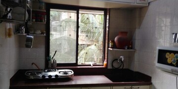 Living Room in 1 BHK Apartment at Monarch CHS, Andheri East – for Sale