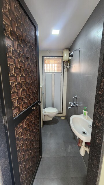 Bathroom in 2 BHK Apartment at Madhuban Heights, Borivali West – for Rent