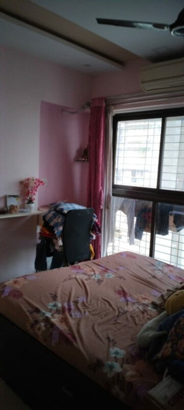 Bedroom in 1 BHK Apartment at Ashray Jaswanti Woods, Mulund West – for Sale