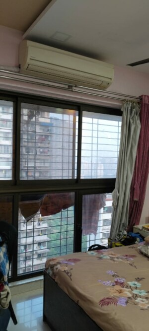 Room in 1 BHK Apartment at Ashray Jaswanti Woods, Mulund West – for Sale