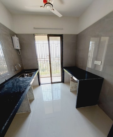Kitchen in 3 BHK Apartment at Regency Antilia, Ulhasnagar – for Sale