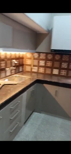 Kitchen in 2 BHK Apartment at Amrapali Silicon City, Sector 76 – for Sale