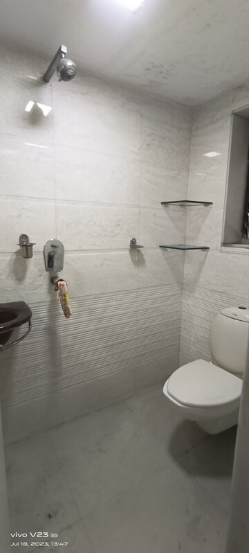 Bathroom in 1 BHK Apartment at Sunrise CHS Mhada, Goregaon East – for Rent