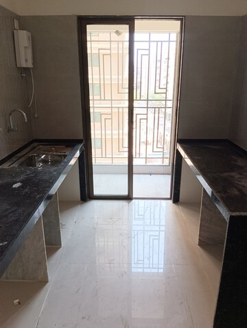 Kitchen in 2 BHK Apartment at Regency Antilia, Ulhasnagar – for Sale