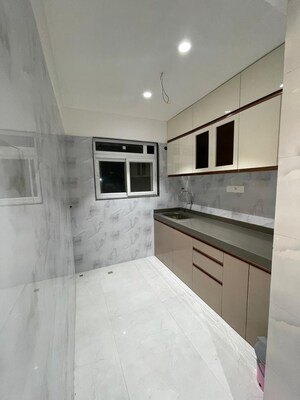 Kitchen in 2 BHK Apartment at Vaibhav Queens Park, Chembur – for Sale