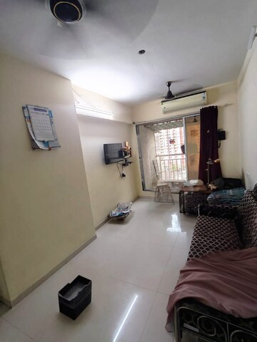 Living Room in 2 BHK Apartment at SM Olive Paradise, Taloja – for Rent