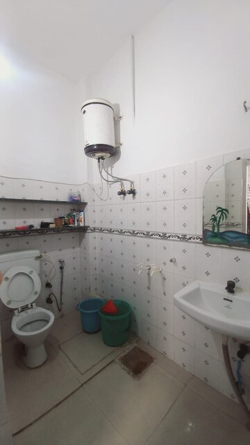 Bathroom in 1 RK Independent House at RWA Apartments Sector 52, Sector 52 – for Rent