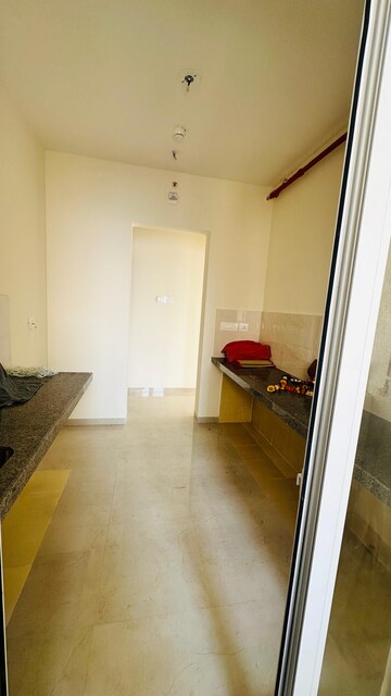 Kitchen in 2 BHK Apartment at Piramal Vaikunth, Balkum Pada – for Rent