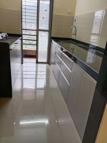 Kitchen in 2 BHK Apartment at Hubtown Greenwoods, Vartak Nagar – for Rent