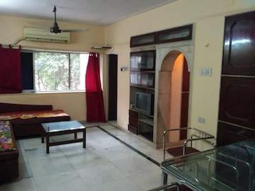 Living Room in 1 BHK Apartment at Juhu – for Rent