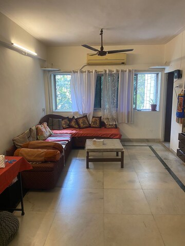 Living Room in 1 BHK Apartment at Juhu – for Rent