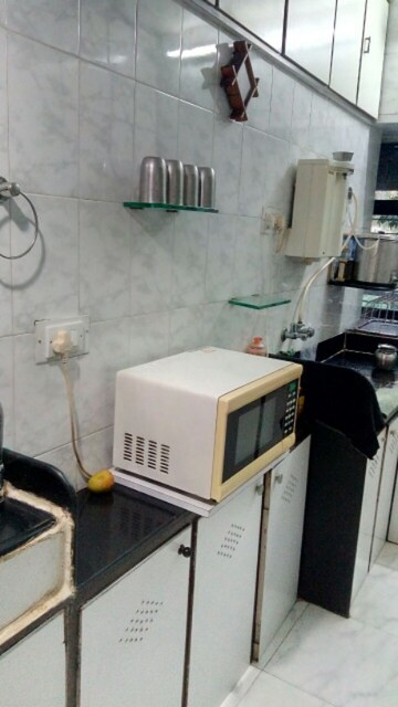 Kitchen in 1.5 BHK Apartment at Juhu – for Rent