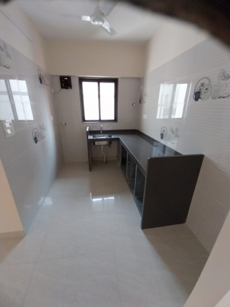 Kitchen, delta-woods 1 Bedroom 440 Sq.Ft. Apartment In Mira Road East Thane 8846311