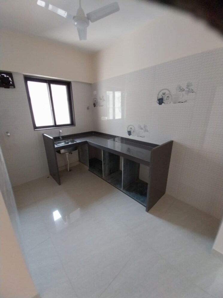 Kitchen, delta-woods 1 Bedroom 440 Sq.Ft. Apartment In Mira Road East Thane 8846311