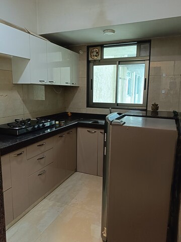 Kitchen in 2 BHK Apartment at Chandak Cornerstone, Worli – for Rent