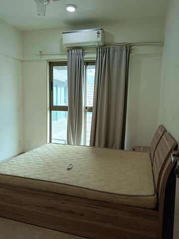 Bedroom in 2 BHK Apartment at Chandak Cornerstone, Worli – for Rent
