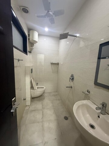 Bathroom in 2 BHK Builder Floor at Kalkaji – for Rent