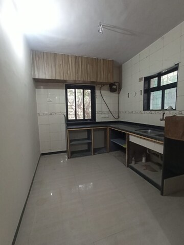Kitchen in 1 BHK Apartment at Lekh Residency, Borivali West – for Rent