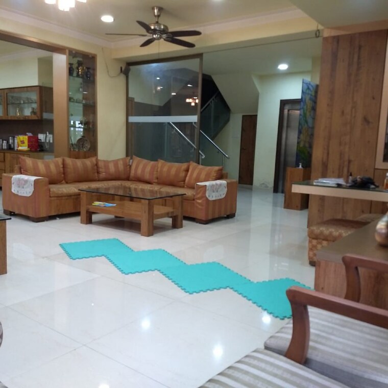 Living Room, oberoi-realty-esquire 5 Bedroom 7000 Sq.Ft. Villa In Gokuldham Colony Mumbai 8846426