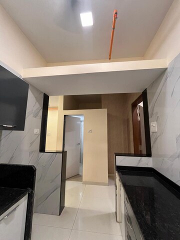 Kitchen in 2 BHK Apartment at Mohan Precious Greens, Ambernath – for Sale