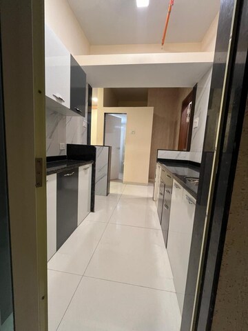 Kitchen in 2 BHK Apartment at Mohan Precious Greens, Ambernath – for Sale