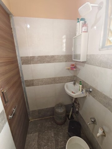 Bathroom in 3 BHK Apartment at Jagatpur – for Rent