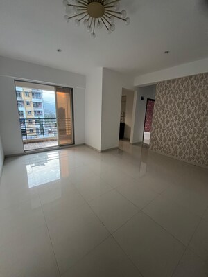 Room in 2 BHK Apartment at Raj Shreeji Iconic, Badlapur East – for Sale