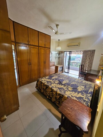 Bedroom in 3 BHK Apartment at Spring Blossom CHS, Ghorpadi – for Rent