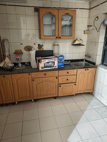 Kitchen in 1 BHK Apartment at Niwara Residency, Seawoods – for Sale