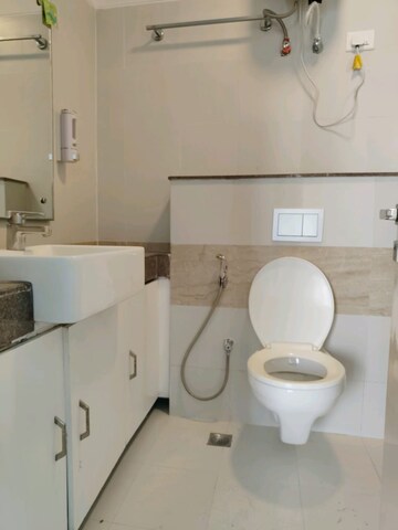 Bathroom in 3 BHK Apartment at Shapoorji Pallonji Joyville Phase 2, Sector 102 – for Rent