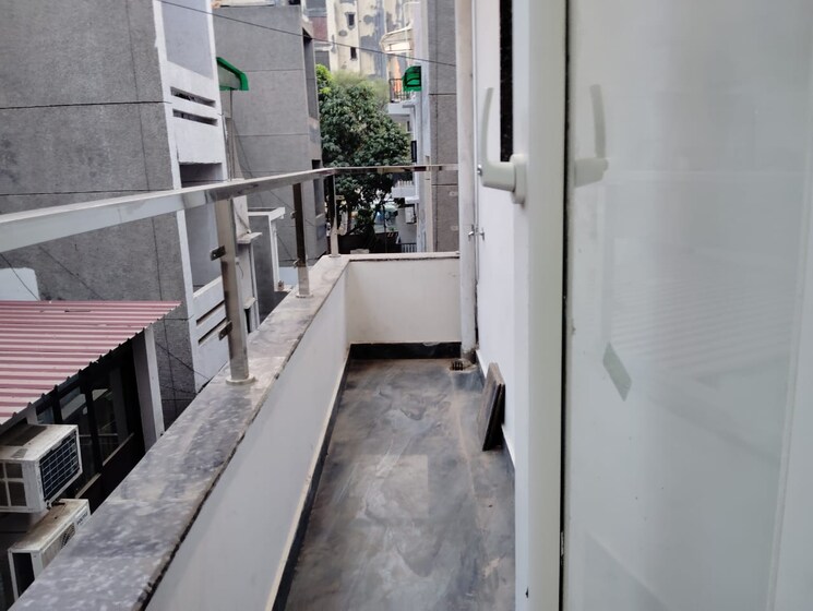 Balcony, madhur-apartment 2.5 Bedroom 1000 Sq.Ft. Apartment In Paschim Vihar Delhi 8846612