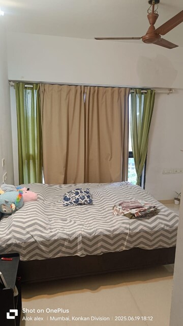 Bedroom in 2 BHK Apartment at Kanakia Rainforest, Andheri East – for Rent