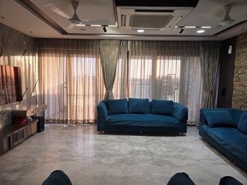 Living Room in 1 BHK Apartment at Lodha Unica, Jogeshwari West – for Sale