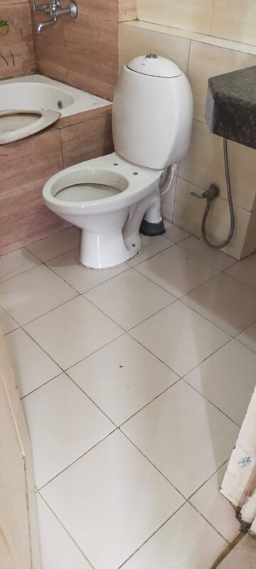 Bathroom in 2.5 BHK Apartment at Rohtas Plumeria, Gomti Nagar – for Rent