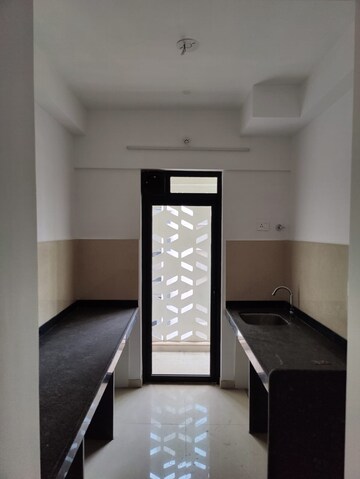 Kitchen in 2.5 BHK Apartment at Lodha Palava Downtown, Dombivli East – for Sale