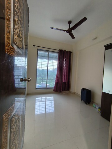 Living Room in 1 BHK Apartment at Space Inn, Ulwe Sector 24 – for Rent
