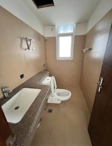 Bathroom in 2 BHK Apartment at Puri Emerald Bay, Sector 104 – for Rent
