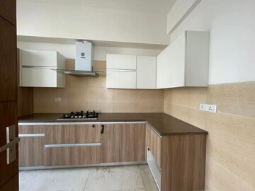 Kitchen in 2 BHK Apartment at Puri Emerald Bay, Sector 104 – for Rent