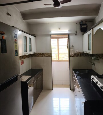 Kitchen in 1.5 BHK Apartment at Madhav Palacia, Ghodbunder Road – for Rent