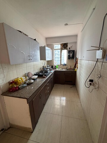 Kitchen in 2 BHK Apartment at Gaur Green City, Indrapuram – for Sale