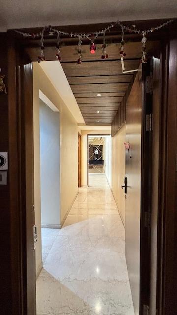 Building Lobby in 3 BHK Apartment at Omkar Alta Monte, Malad East – for Rent