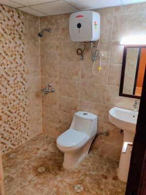 Bathroom in Studio Apartment at Supertech Czar Suites, Omicron I Greater Noida – for Sale