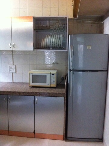 Kitchen in 2 BHK Apartment at Namaskar Apartment, Santacruz East – for Rent