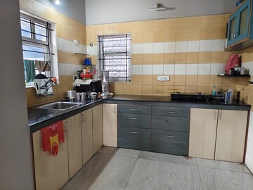 Kitchen in 2 BHK Builder Floor at Halasuru – for Rent