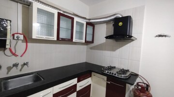 Kitchen in 2 BHK Apartment at Gulmohar Helios, Kharadi – for Rent