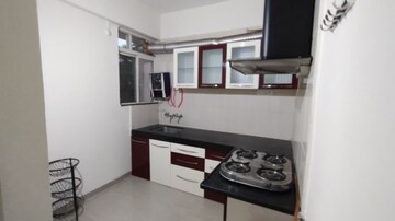Kitchen in 2 BHK Apartment at Gulmohar Helios, Kharadi – for Rent