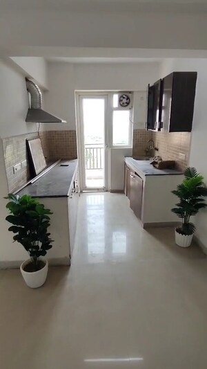 Kitchen in 2.5 BHK Apartment at Sethi Max Royale, Sector 76 – for Sale