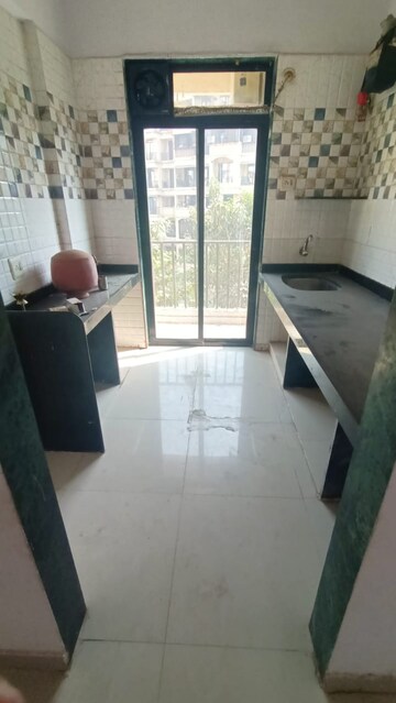 Kitchen in 1 BHK Apartment at Kohinoor Castles, Ambernath – for Sale